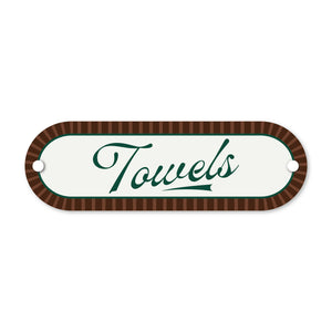 Decorative sign with 'Towels' text on a white background