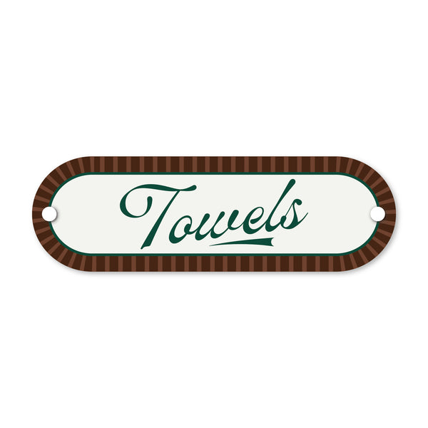 Decorative sign with 'Towels' text on a white background