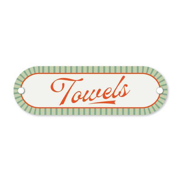 Decorative sign with 'Towels' text on a white background