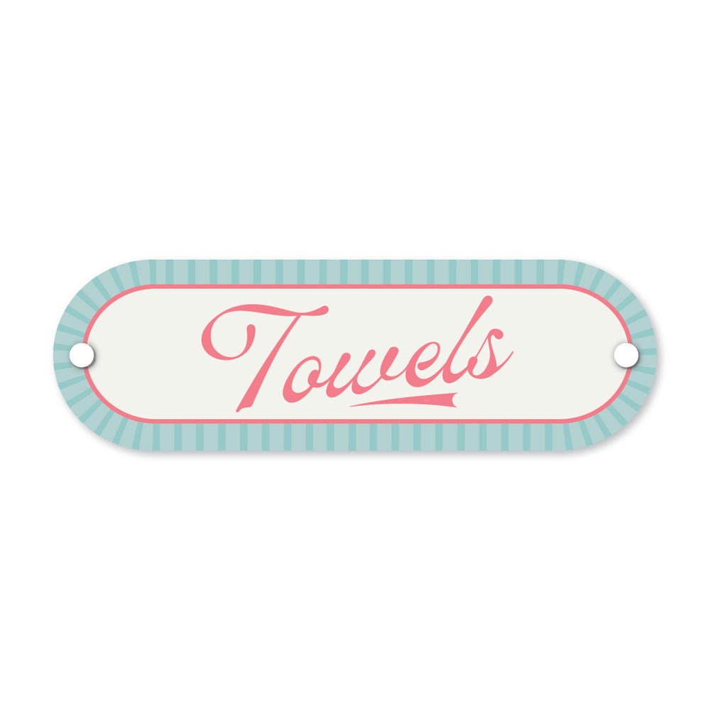 Decorative sign with 'Towels' text on a white background