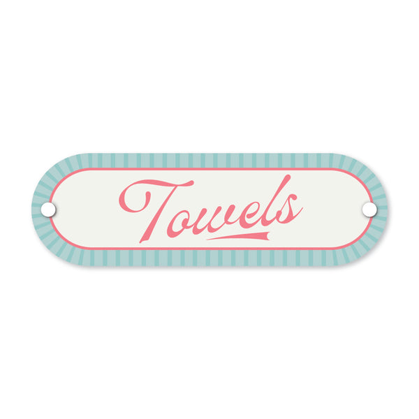 Decorative sign with 'Towels' text on a white background