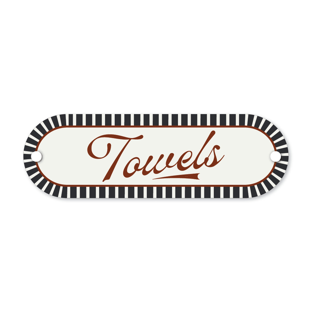 Decorative sign with 'Towels' text and black and white striped border on a white background